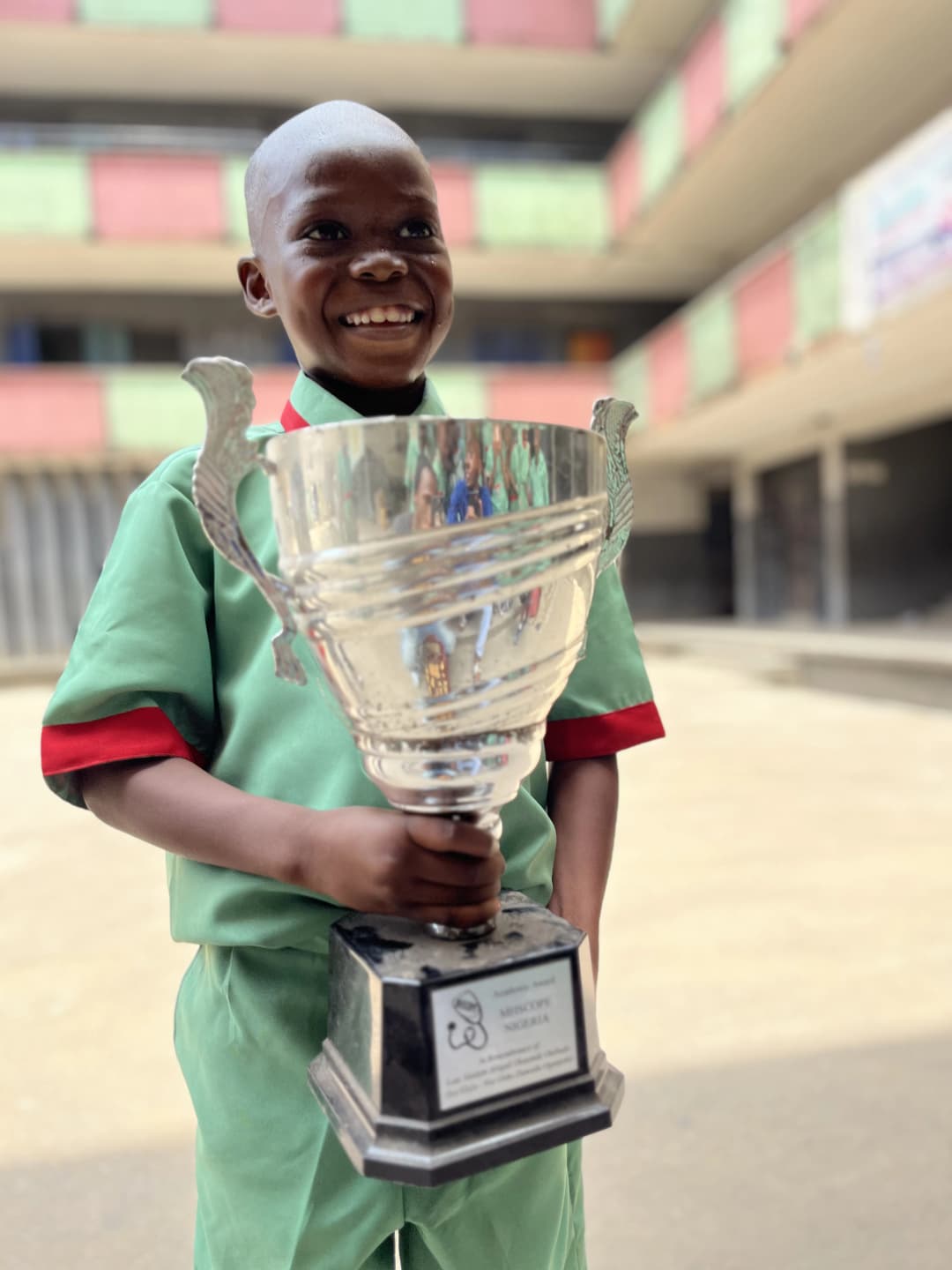 Boy holding a trophy